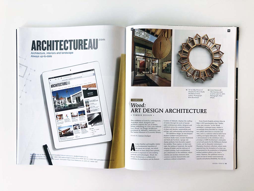 A photograph of a Houses Magazine spread showing Damian Madigan's article titled "Wood: Art, Design, Architecture".